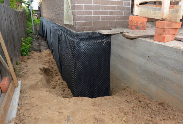 Happy homeowners after waterproofing job in Maineville